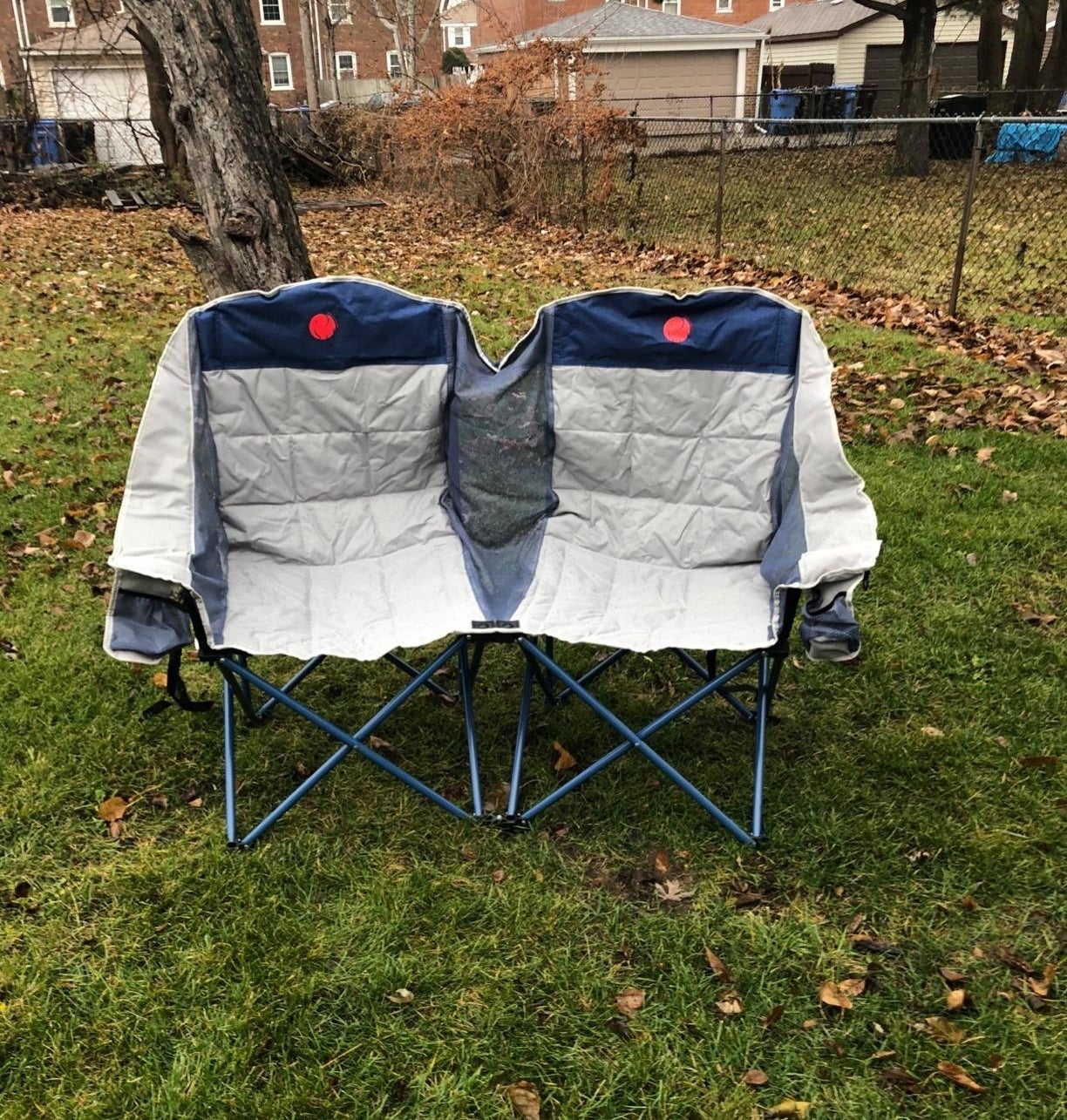 camping chair that looks like two camping chairs melded together with no middle arm rests