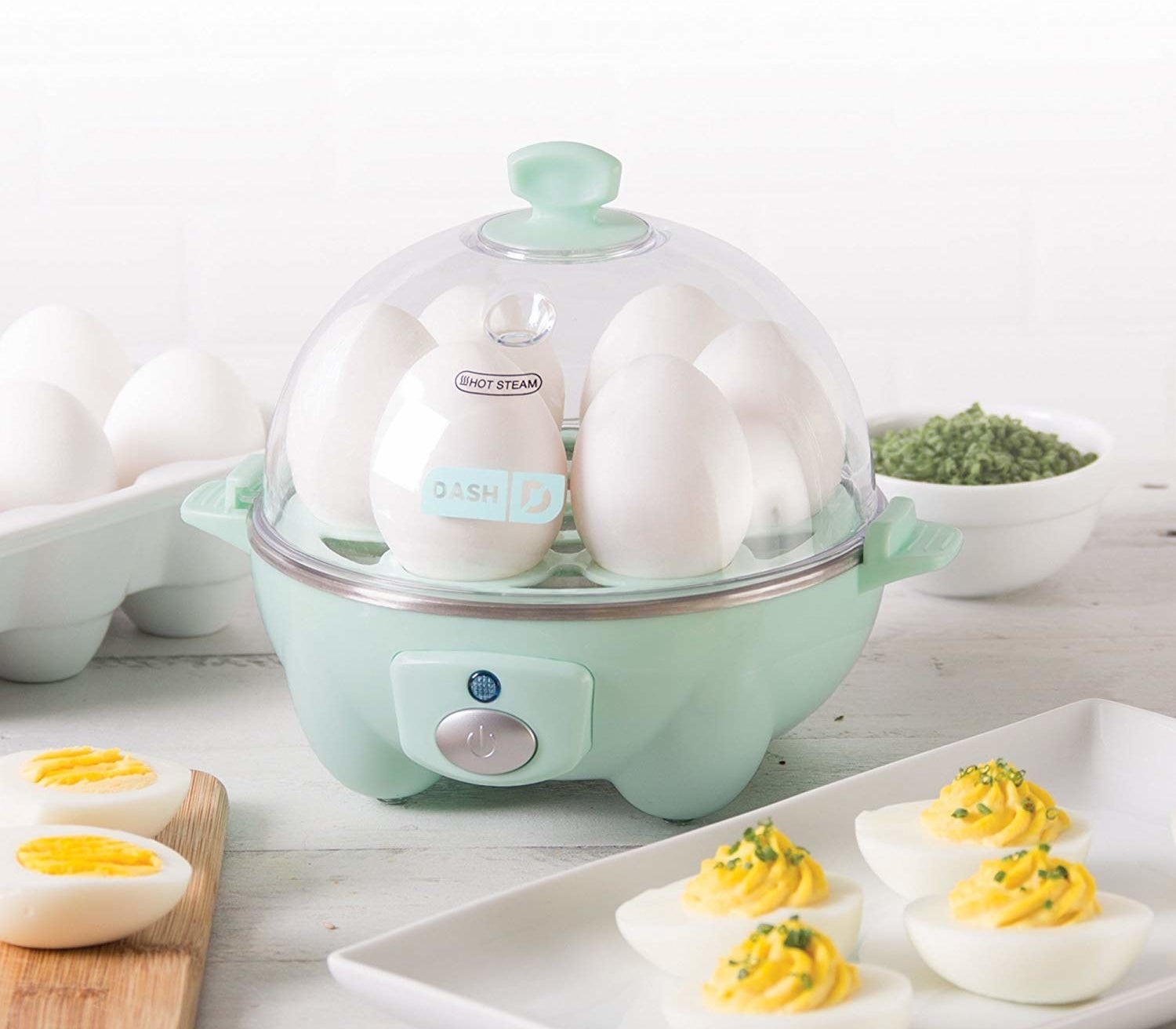 The dome-shaped egg cooker in aqua