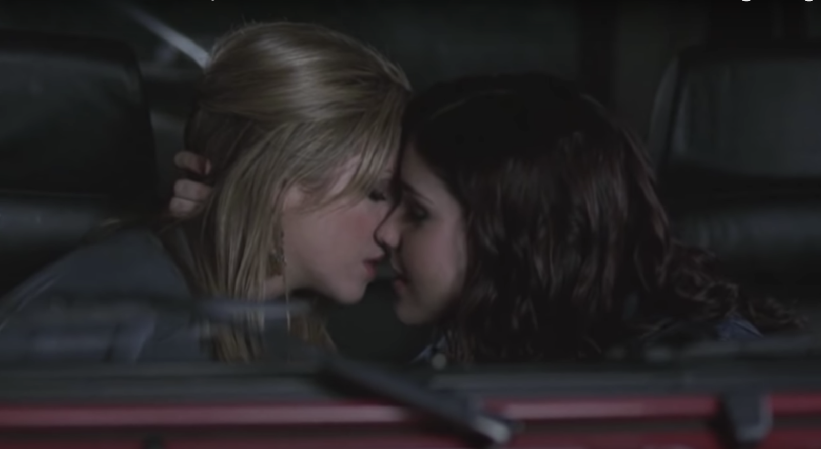 Brittany Snow and Sophia Anna Bush kissing in a car 