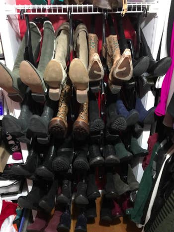 reviewer's closet with boot organizers in it