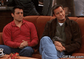 Gif of Joey and Chandler from &quot;Friends&quot; clapping in approval