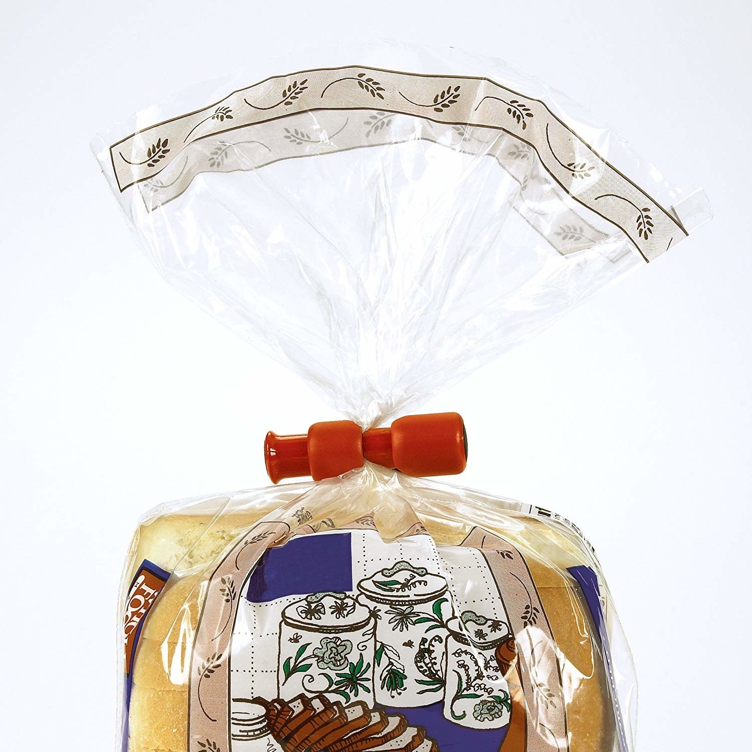 A bag of bread with the red closure