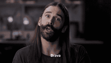 person with long hair and a beard claps and says &quot;brave&quot;