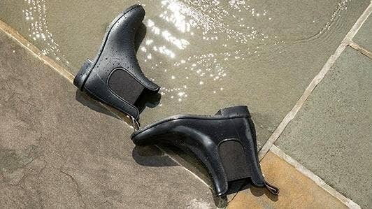 black Chelsea-style rain boots