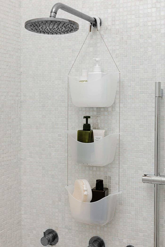 A three bucket shower caddy strung together with a sleek bead string