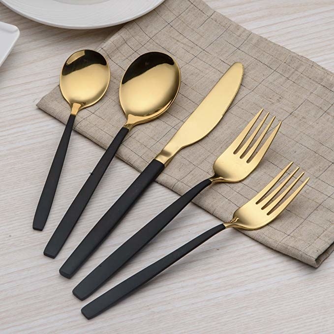 the cutlery set in black and gold