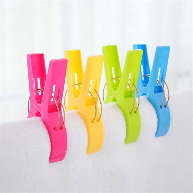 The beach clips in pink, yellow, green, and blue