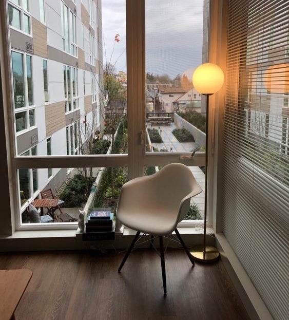 Reviewer's photo of the globe lamp with gold base