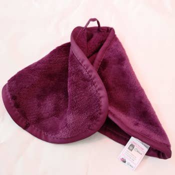 the makeup removing cloth in purple