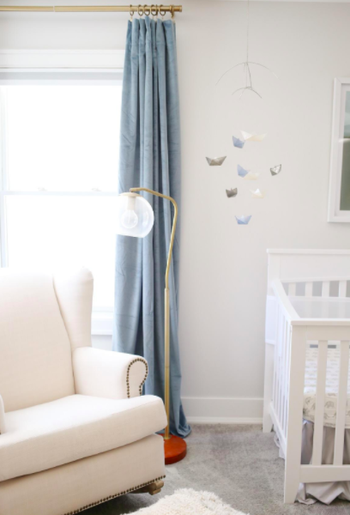 A customer review photo of the velvet curtains in dark slate