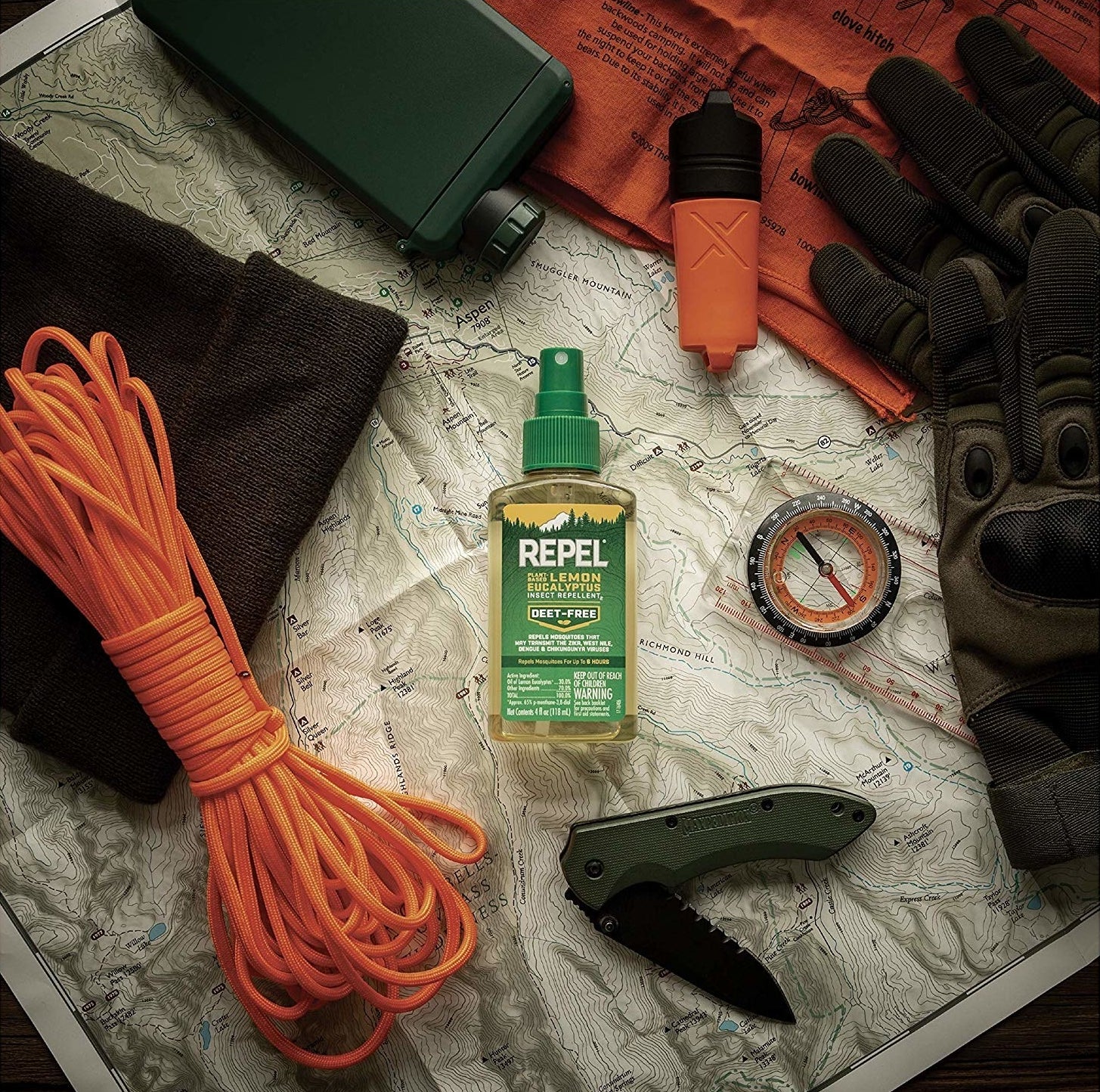 The bug repellent in a spray bottle