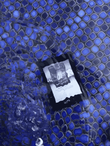 gif of a waterproof kindle underneath the water