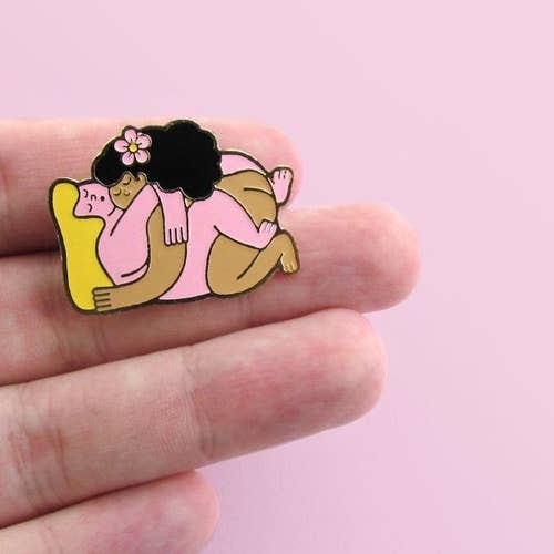 the lesbian pin of two lovers embracing