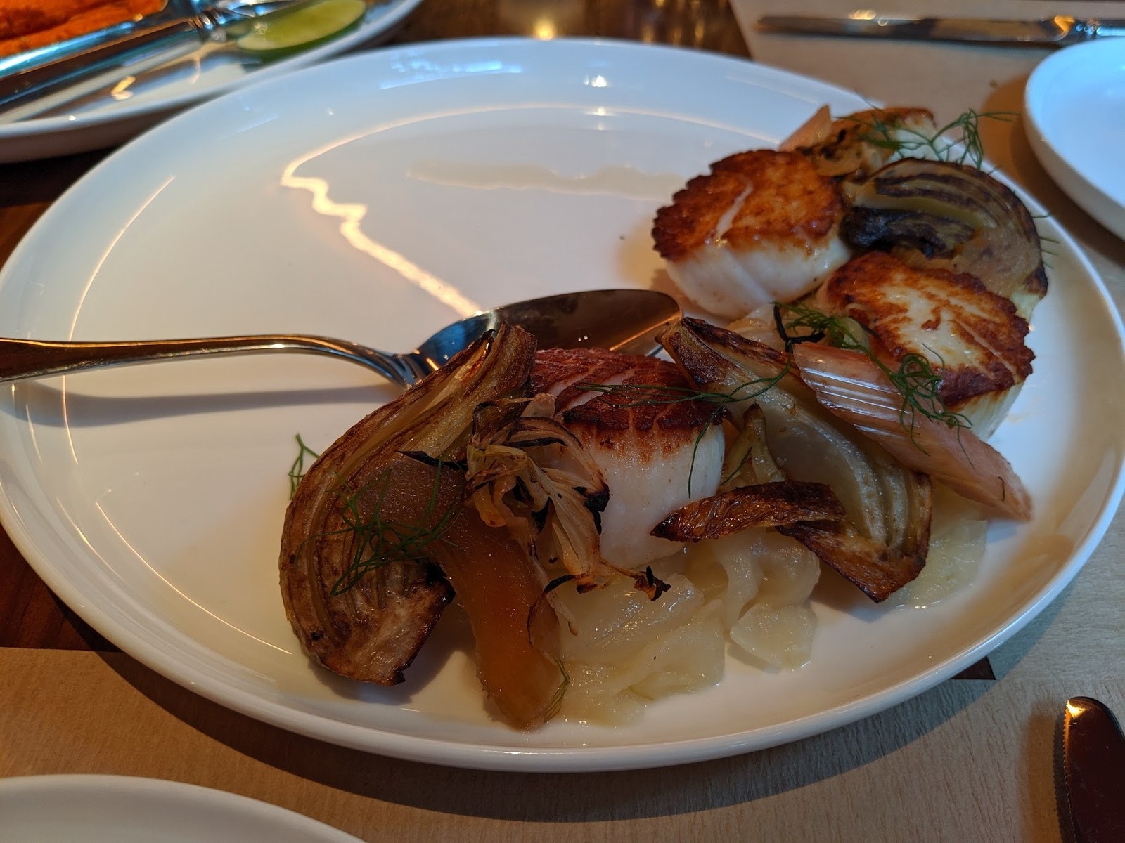 You can never go wrong with seared diver scallops. Perfectly caramelized plump scallops are accompanied by roasted baby fennel, spring onion lime compote, and glazed rhubarb in this light yet flavorful dish.