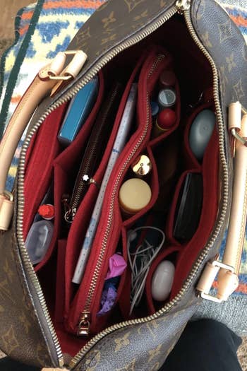 the same purse organized with a red insert