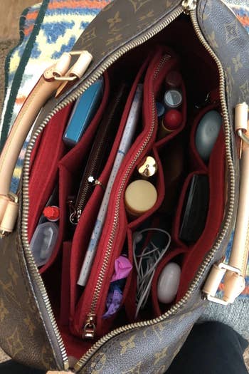 the same purse organized with a red insert