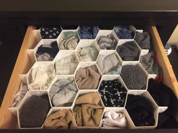 The same drawer, with the socks neatly organized in the dividers
