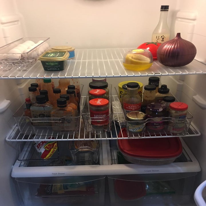 The same fridge organized with the bins; there's way more space