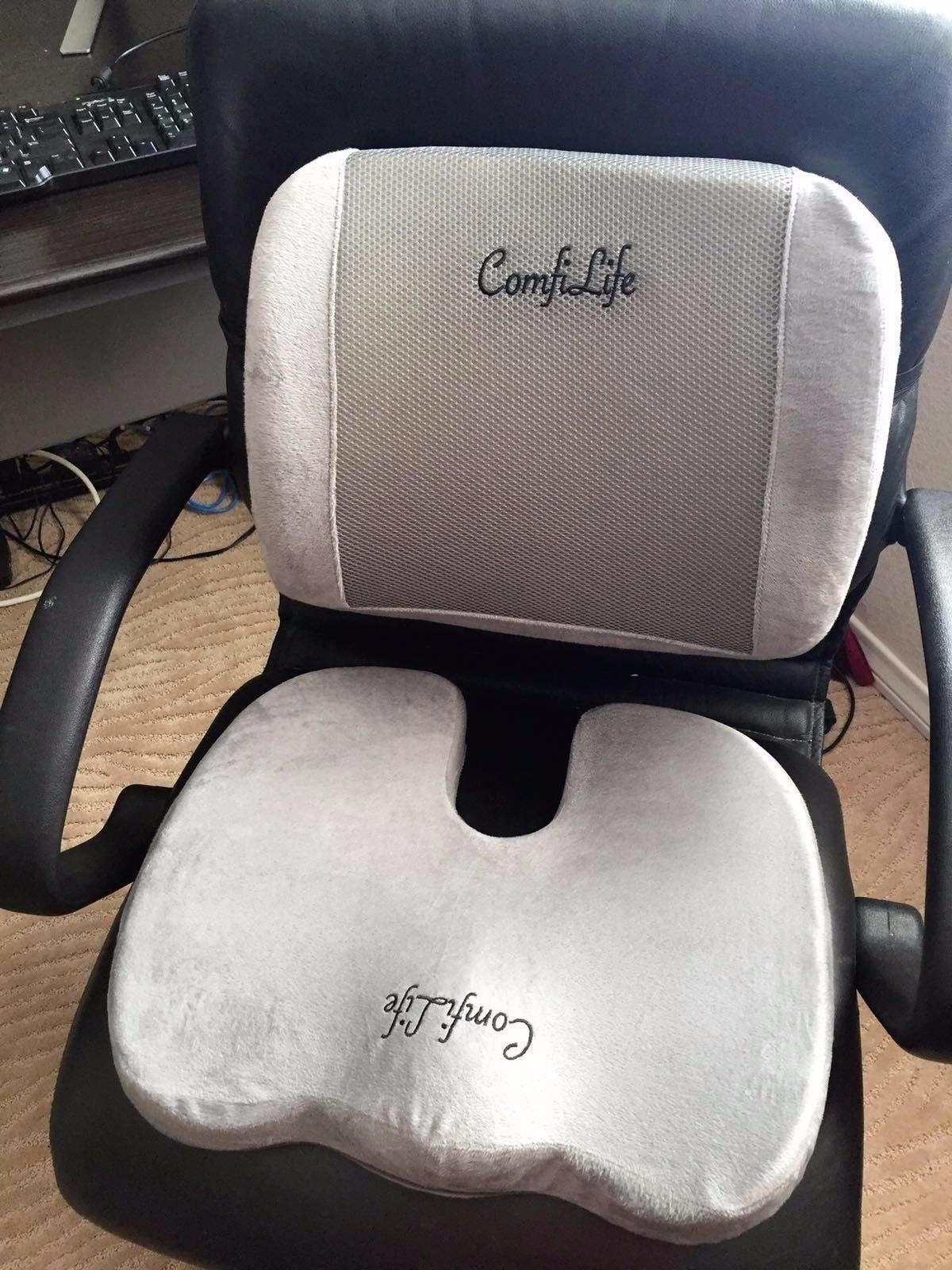 Reviewer photo of lumbar pillow and seat cushion placed on office chair