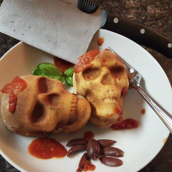 Reviewer photo of skull-shaped calzones made with the pan