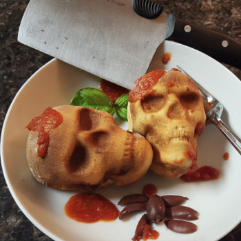 Reviewer photo of skull-shaped calzones made with the pan