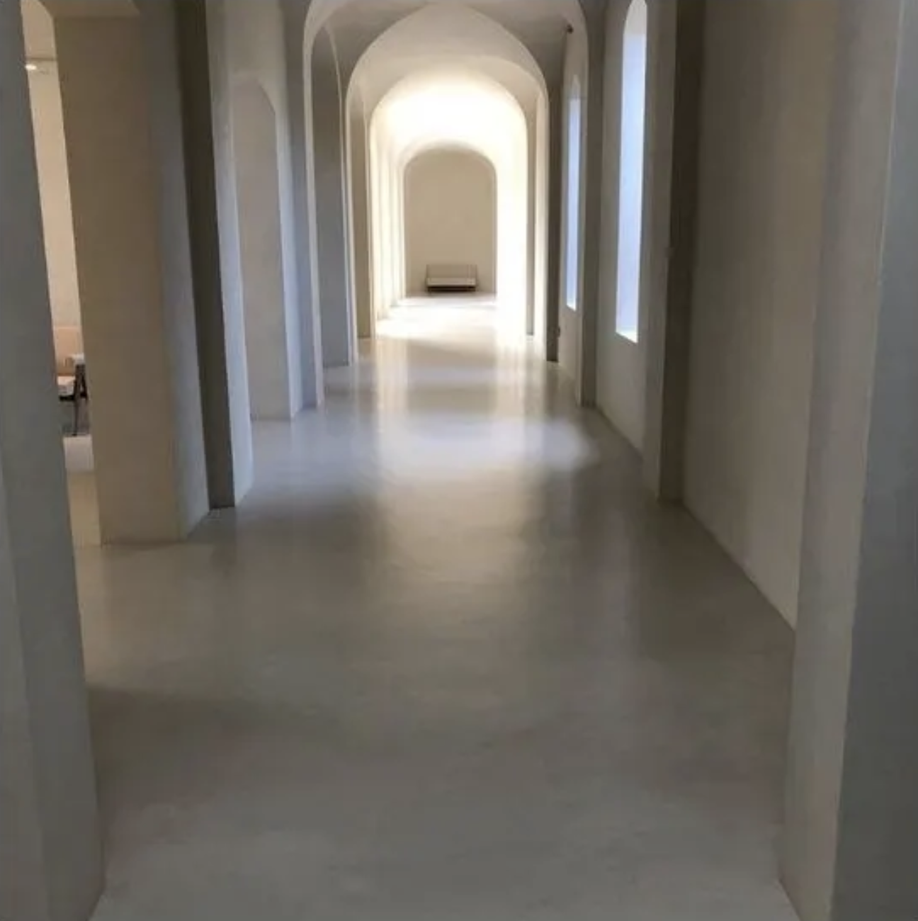 the hallway is absolutely bare and the chandelier is gone