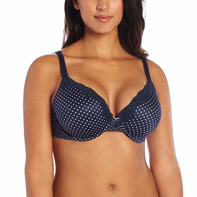 Model wearing the navy bra with white polka dots
