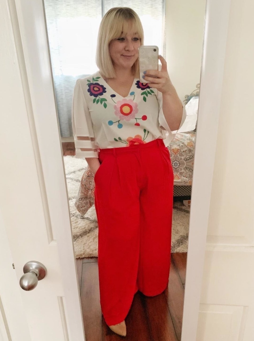 Reviewer wearing the pants in red