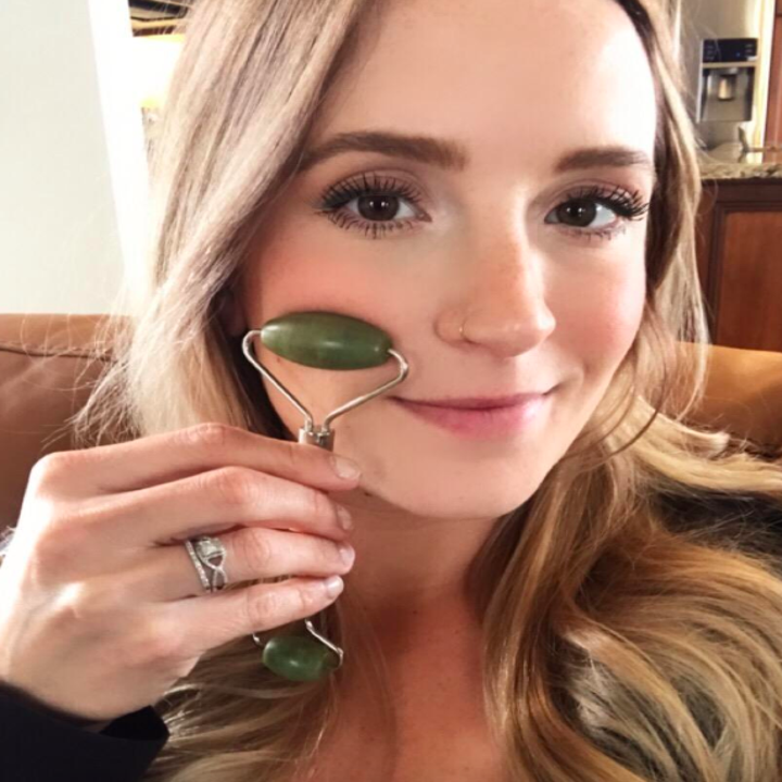 reviewer using the jade roller