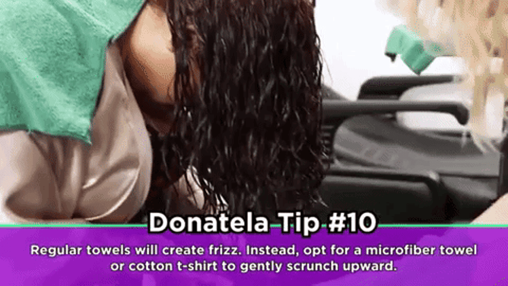 Gif of a BuzzFeeder getting their hair towel-dried with a caption that says opt for a microfiber towel or cotton T-shirt 
