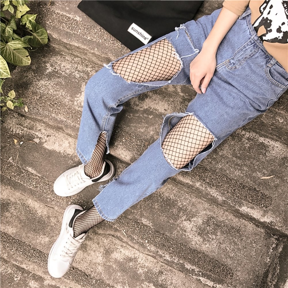 model wears fishnets under jeans 