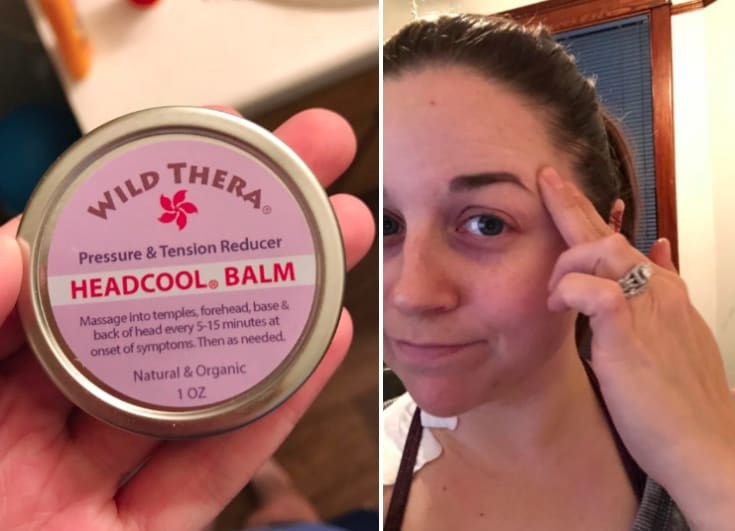 Reviewer applying the Wild Thera Headcool Balm to their temples