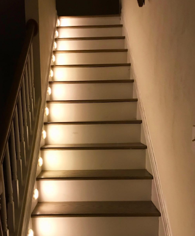 A staircase lit up nicely by the product