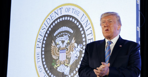 Trump Spoke In Front Of Parody Presidential Seal At Point USA Conference