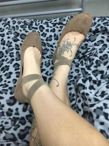reviewer photo of them wearing flats in taupe