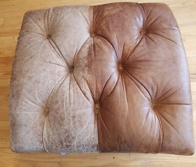 A tufted leather ottoman, the right half with greyish, old leather,  and the right half a rich brown leather after conditioning