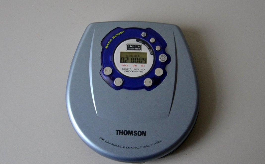 A photo of a grey portable CD player.