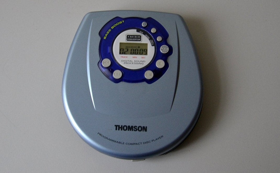 A photo of a grey portable CD player.