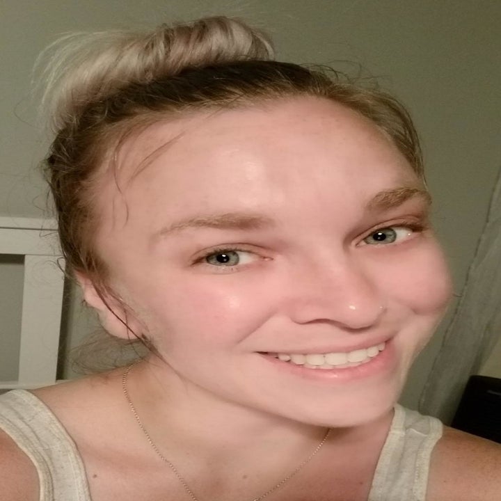 same reviewer with glowing, dewy skin after using the foaming face mask