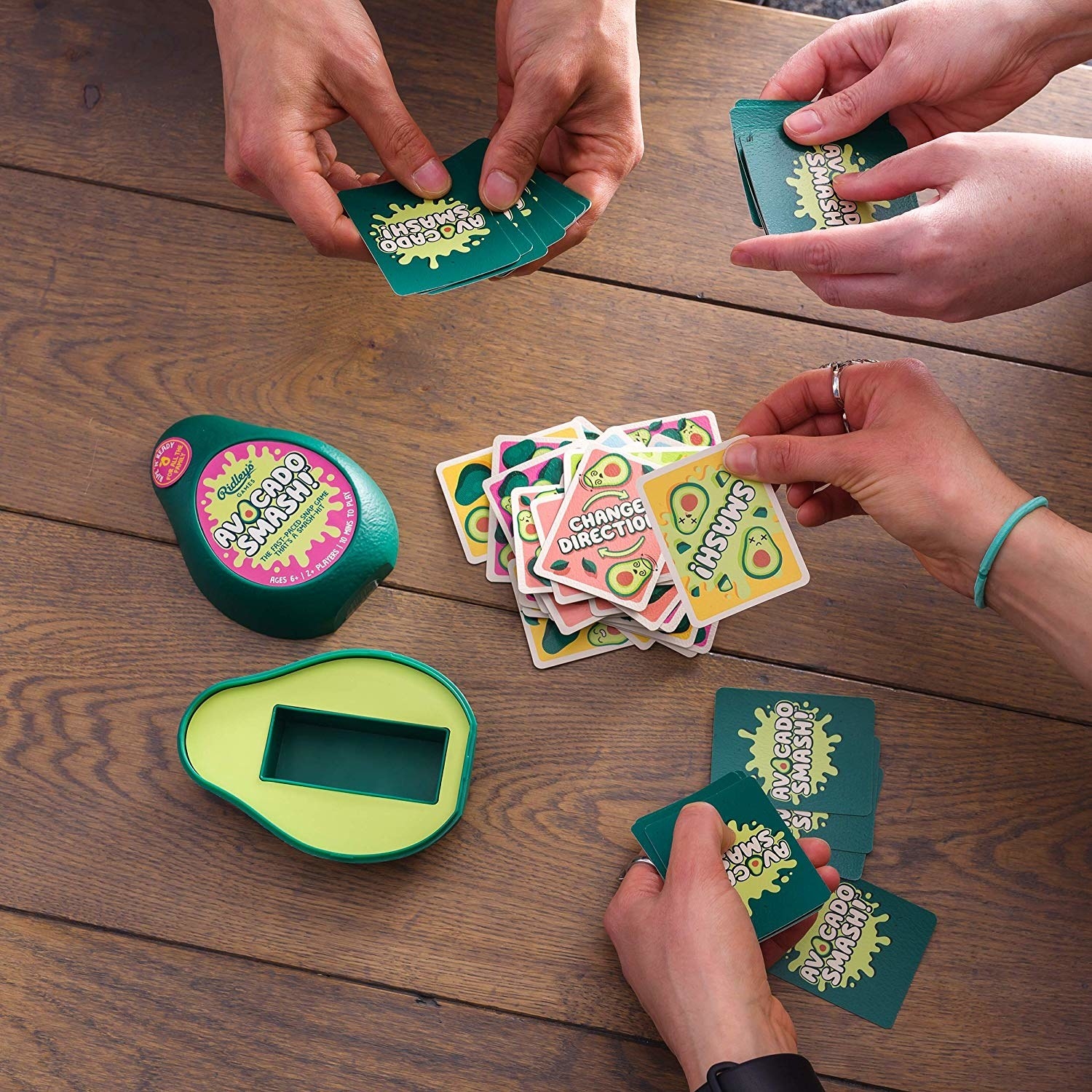 the card game with a matching avocado shaped box