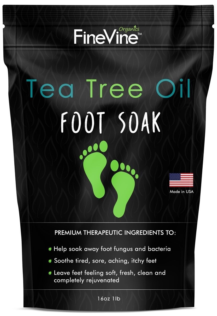 a black bag of salt with a green foot logo on it