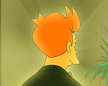 gif of Fry from the cartoon &quot;futurama&quot; turning around slowly while glowing