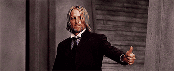 Haymitch giving a thumbs-up