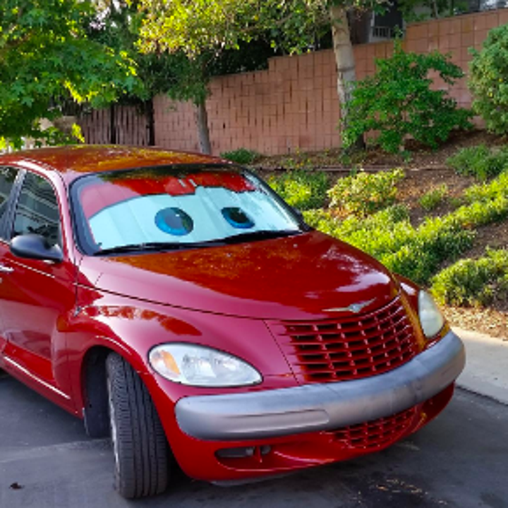 A different reviewer's car with the visor in red to match their paint