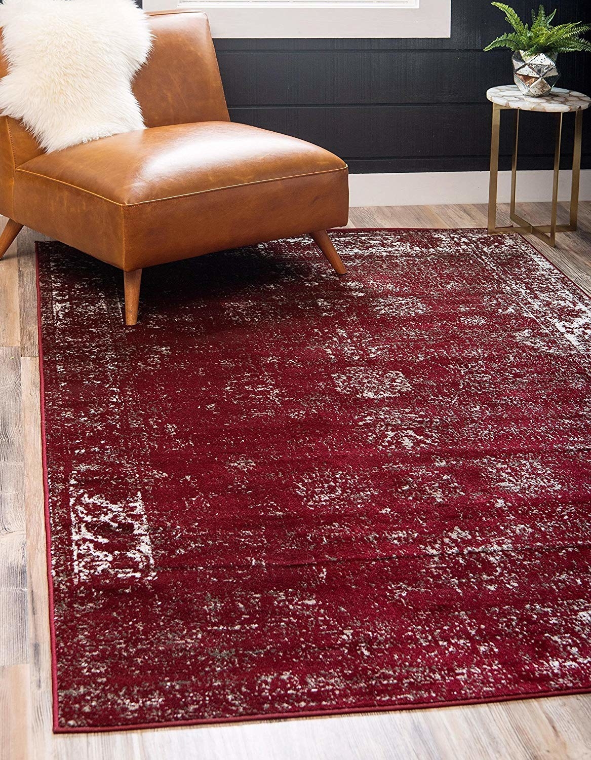 the dark red rug