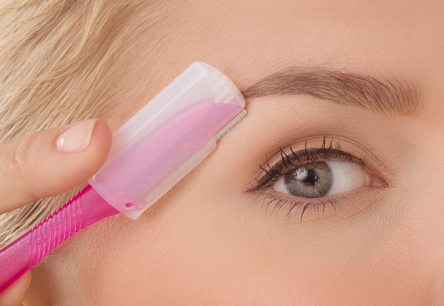 model uses straight razor with plastic guard 