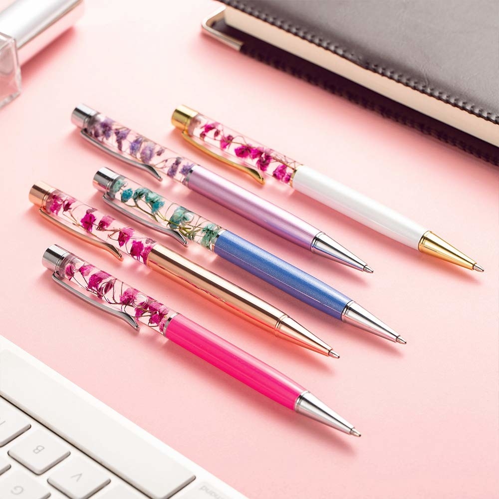 The colorful pens, featuring flowers suspended in liquid