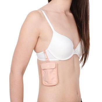 model wearing the pouch clipped onto the side of her bra