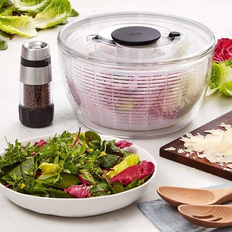 A bowl with a top that lets you spin the inner layer to remove moisture from greens