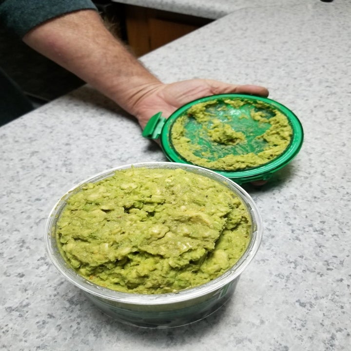 A reviewer image of perfectly green avocado inside of the container after opening